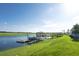Lake with kayaks and a gazebo at 3161 Paradox Cir # 301, Kissimmee, FL 34746