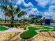 Resort-style pool with waterslide and mini golf at 3161 Paradox Cir # 301, Kissimmee, FL 34746