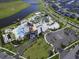 Aerial view of community pool and surrounding area at 3161 Paradox Cir # 301, Kissimmee, FL 34746