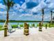 Relaxing lakefront patio with seating at 3161 Paradox Cir # 301, Kissimmee, FL 34746