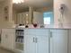 Double vanity bathroom with a large mirror and plenty of cabinet space at 3161 Paradox Cir # 301, Kissimmee, FL 34746