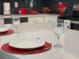 Kitchen island with place settings for two at 3161 Paradox Cir # 301, Kissimmee, FL 34746