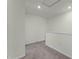 Loft area with grey carpet and overhead lighting at 3361 Private Oak Dr, Apopka, FL 32703