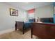 Bedroom with two twin-size beds and blue bedding at 4204 Oakview Dr, Davenport, FL 33837