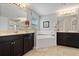 Elegant bathroom with double vanity, soaking tub, and separate shower at 4204 Oakview Dr, Davenport, FL 33837