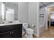 Bathroom featuring a toilet, sink, and shower/tub combo at 4204 Oakview Dr, Davenport, FL 33837