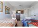 Bedroom with two twin beds, dresser, and wall art at 4204 Oakview Dr, Davenport, FL 33837