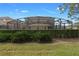 Landscaped backyard with privacy hedge and pool at 4204 Oakview Dr, Davenport, FL 33837