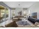Bright and airy living room with sliding glass doors leading to a patio at 4204 Oakview Dr, Davenport, FL 33837