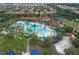 Community pool and playground with surrounding homes at 4204 Oakview Dr, Davenport, FL 33837