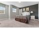Bedroom with a queen bed, window, and closet at 4204 Oakview Dr, Davenport, FL 33837