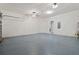 Spacious garage with ceiling fans and ample storage at 4204 Oakview Dr, Davenport, FL 33837