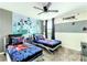Twin bedroom with Star Wars themed bedding and mural at 8843 Interlocking Ct, Davenport, FL 33896