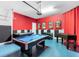 Game room with a pool table, air hockey, and foosball table at 8843 Interlocking Ct, Davenport, FL 33896