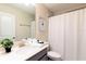 Single vanity bathroom with shower/tub combo at 8843 Interlocking Ct, Davenport, FL 33896