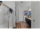 Clean bathroom with shower, vanity, and wood flooring at 928 Orchid Grove Blvd, Davenport, FL 33837