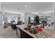 Kitchen features granite countertops and island overlooking dining and Gathering room at 928 Orchid Grove Blvd, Davenport, FL 33837