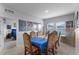 Dining room features a formal table and chairs with access to a bedroom at 928 Orchid Grove Blvd, Davenport, FL 33837