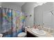 Clean bathroom with shower/tub combo and vanity at 928 Orchid Grove Blvd, Davenport, FL 33837
