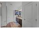 Bathroom with a double vanity and wood floor at 928 Orchid Grove Blvd, Davenport, FL 33837
