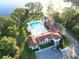 Aerial view of community pool and clubhouse at 10564 Royal Cypress Way, Orlando, FL 32836