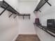 Spacious walk-in closet with custom shelving and ample storage at 10564 Royal Cypress Way, Orlando, FL 32836