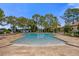 Relaxing community pool with plenty of lounge chairs at 10564 Royal Cypress Way, Orlando, FL 32836