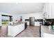 Modern kitchen with stainless steel appliances and an island at 11648 Paragraph Rd, Orlando, FL 32832