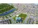Aerial view of community, featuring a pool, playground, and lake at 11648 Paragraph Rd, Orlando, FL 32832