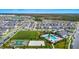 Aerial view of community amenities including pools and courts at 11648 Paragraph Rd, Orlando, FL 32832