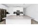 Modern kitchen with gray quartz countertops and island at 11648 Paragraph Rd, Orlando, FL 32832