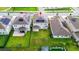 Aerial view of house featuring solar panels and backyard at 11648 Paragraph Rd, Orlando, FL 32832