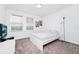 Spacious bedroom with a queen bed and plenty of natural light at 11648 Paragraph Rd, Orlando, FL 32832