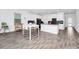 Modern kitchen with white cabinets and grey countertops at 11648 Paragraph Rd, Orlando, FL 32832