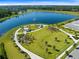 Scenic lakefront park with walking paths and gazebo at 11648 Paragraph Rd, Orlando, FL 32832