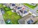 Aerial view of house with solar panels and a large backyard at 11648 Paragraph Rd, Orlando, FL 32832