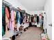 Large walk-in closet with ample hanging space and shelving at 11648 Paragraph Rd, Orlando, FL 32832