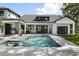 Luxury pool and spa surrounded by a spacious patio at 1206 Sutter Ave, Gotha, FL 34734