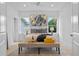 Main bedroom with a king-size bed and en-suite bathroom at 1795 Walker Ave, Winter Park, FL 32789