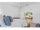 Main bedroom with a king-size bed and access to the living room at 1795 Walker Ave, Winter Park, FL 32789