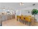 Modern kitchen with white cabinets, quartz countertops, and gold accents at 1795 Walker Ave, Winter Park, FL 32789