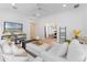 Spacious living room with comfy seating and plenty of natural light at 1795 Walker Ave, Winter Park, FL 32789
