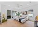 Light and airy living room with hardwood floors and patio access at 1795 Walker Ave, Winter Park, FL 32789