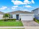 Charming single-Gathering home with a 2-car garage and landscaped yard at 3286 Hanging Tide St, Winter Garden, FL 34787