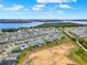Community overview showcasing lakefront homes and landscape at 3286 Hanging Tide St, Winter Garden, FL 34787