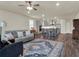 Bright and airy living room with open floor plan and comfortable seating at 3286 Hanging Tide St, Winter Garden, FL 34787