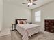 Serene bedroom with a queen bed and a neutral color scheme at 3286 Hanging Tide St, Winter Garden, FL 34787