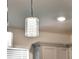 Stylish kitchen light fixtures illuminate the modern space at 3286 Hanging Tide St, Winter Garden, FL 34787