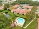 Aerial view of community pool and surrounding homes at 3336 Gray Fox Cv # 3336, Apopka, FL 32703