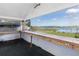 Covered porch overlooking the lake and backyard at 4801 Beach Blvd, Orlando, FL 32803